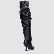 Black high boots with a thin heel