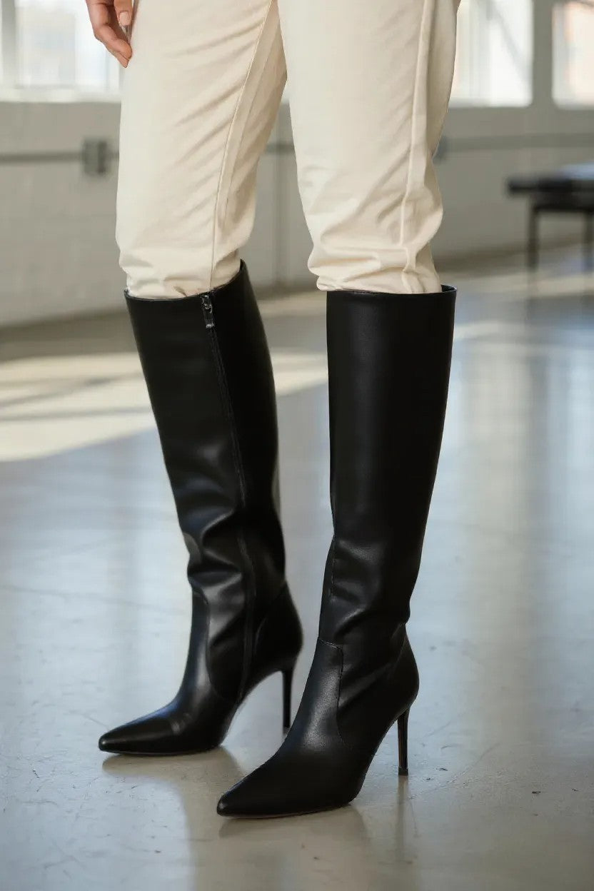 Black boots on a thin heel