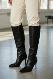 Black boots on a thin heel