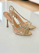 Gold sandals on a thin heel