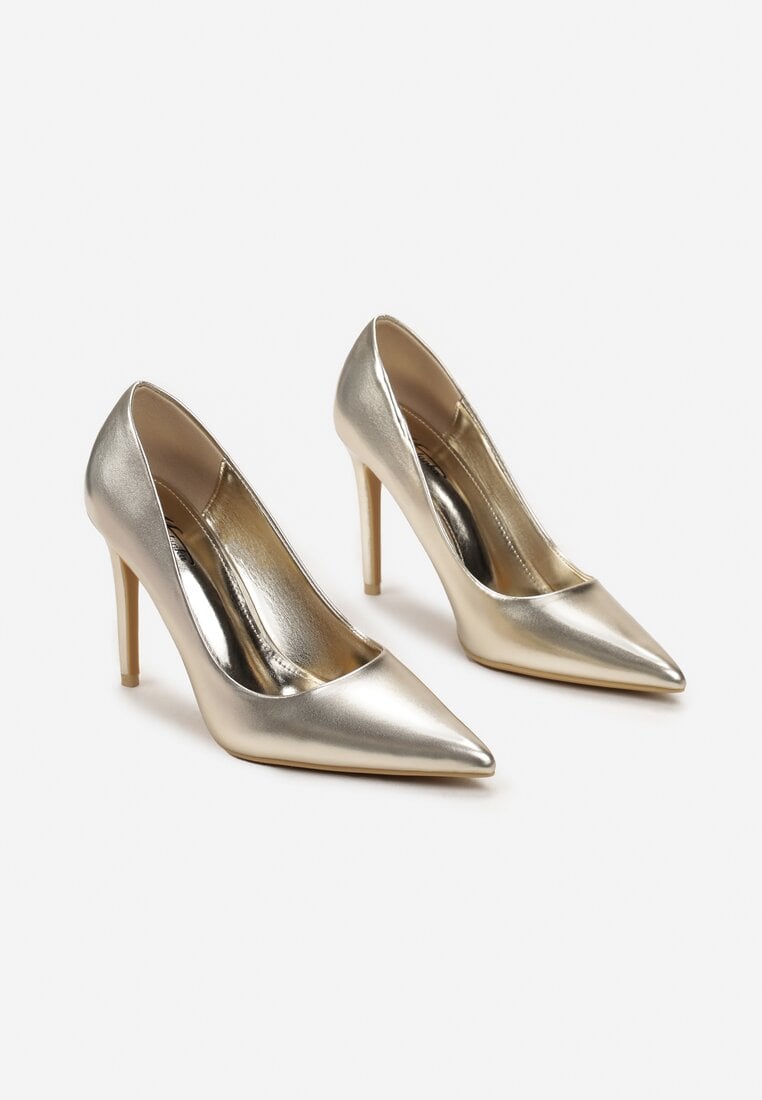 Gold pumps with a thin heel
