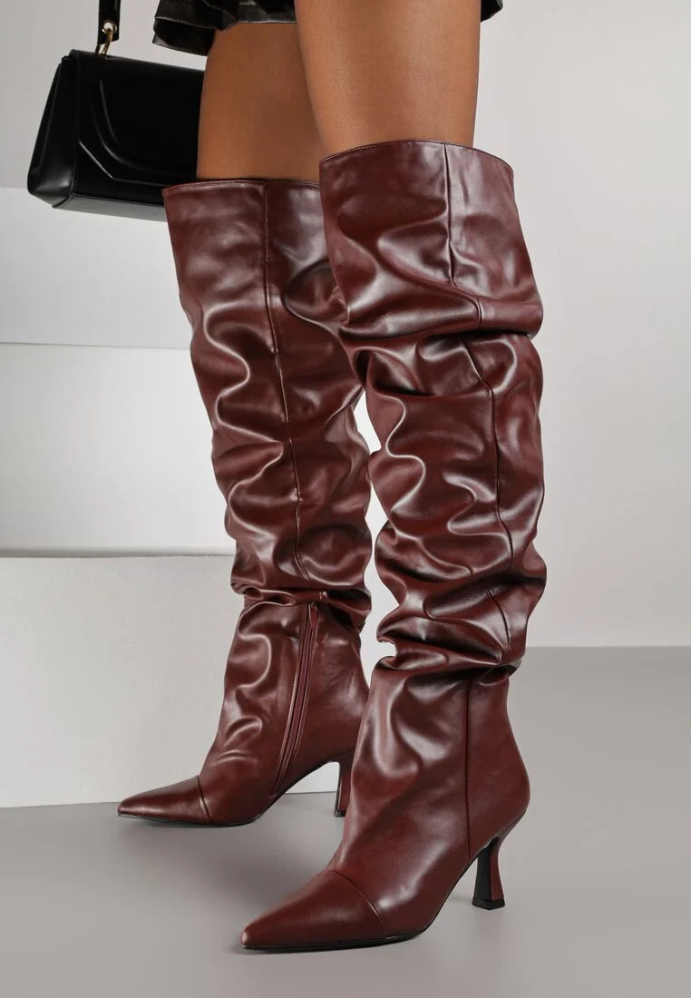 Burgundy high boots with a thin heel