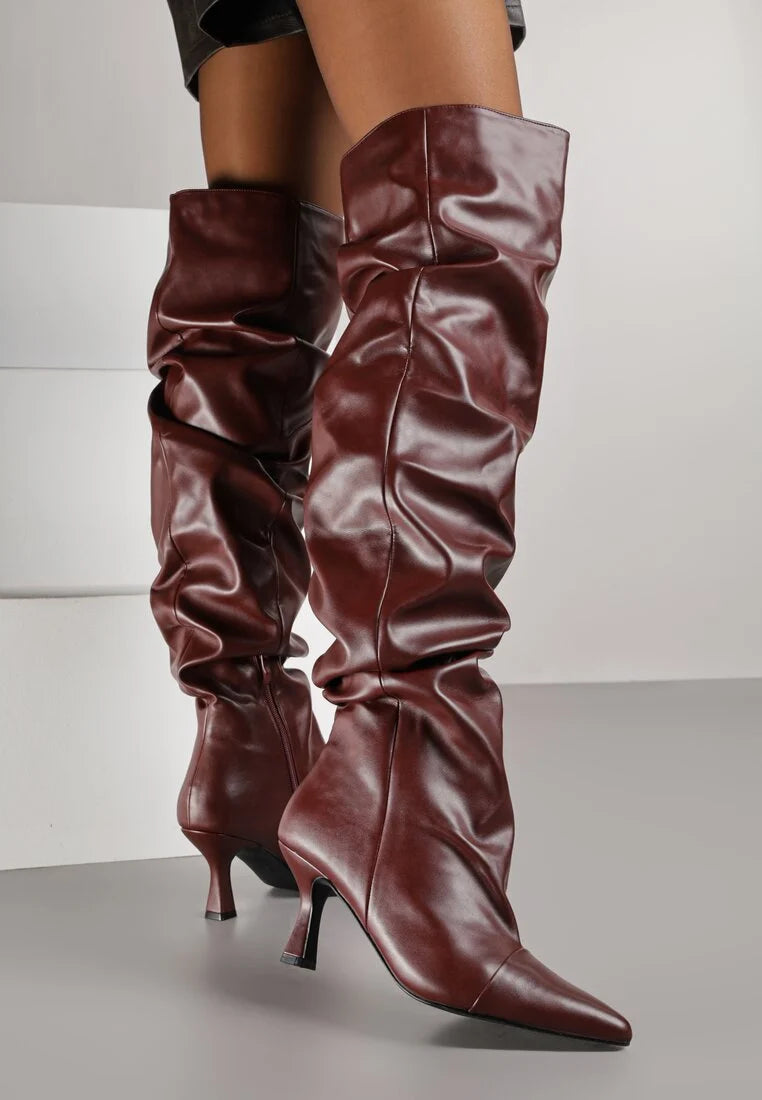 Burgundy high boots with a thin heel