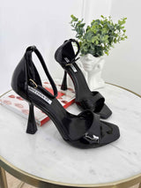 Black sandals with thin heels