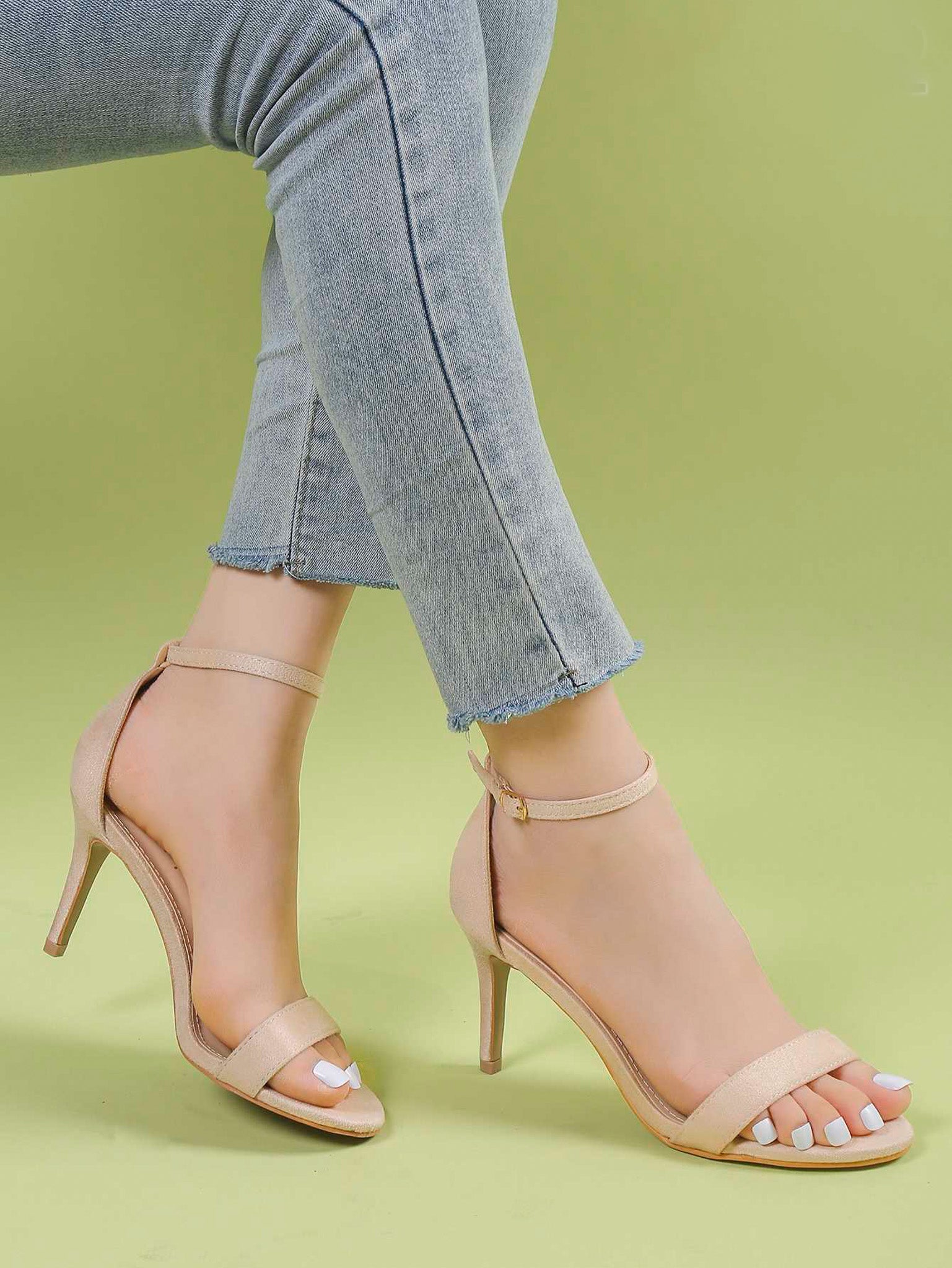 Beige sandals on a thin heel