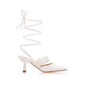 White stilettos with a thin heel