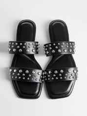 Black flat slippers