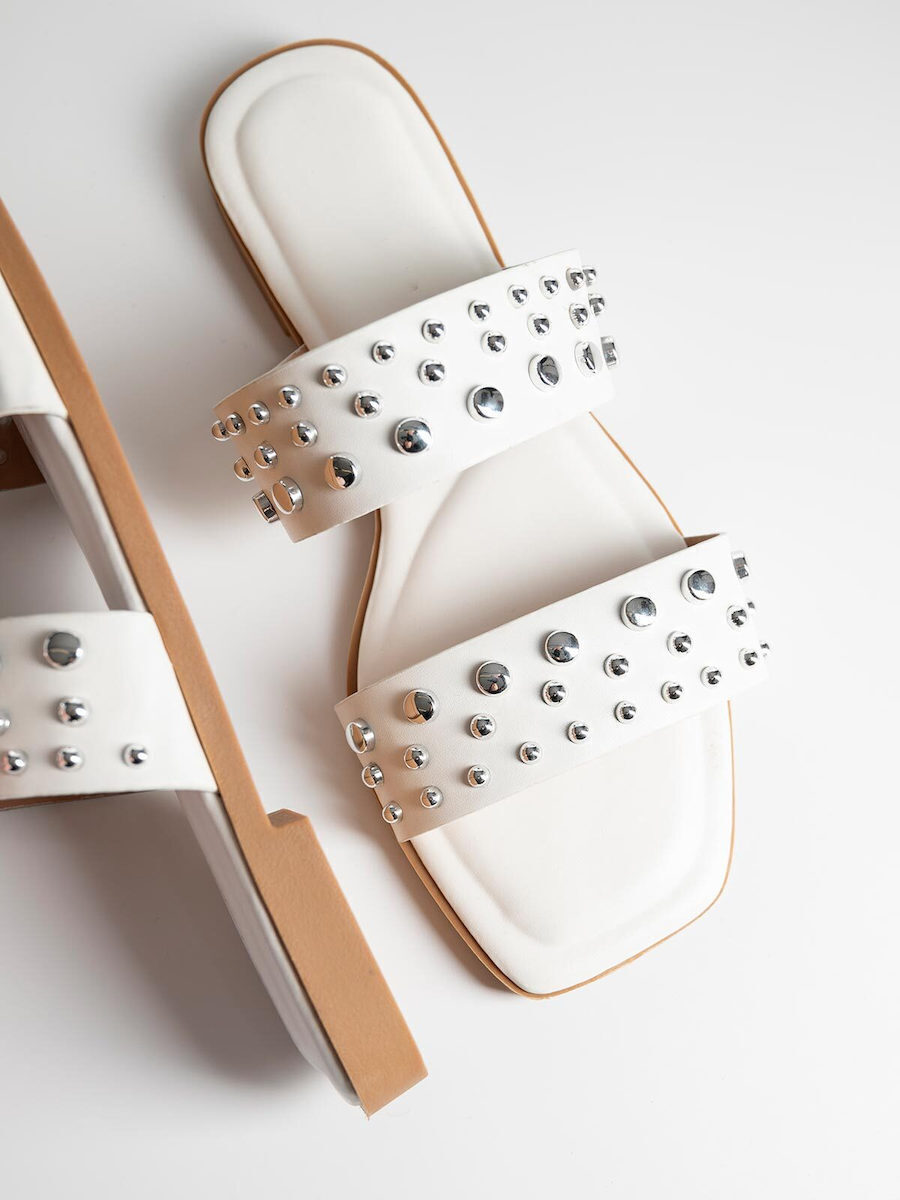 White flat slippers