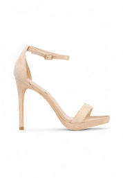 Beige sandals on a thin heel