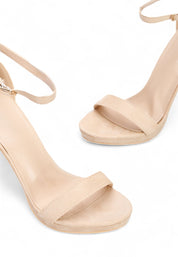 Beige sandals on a thin heel