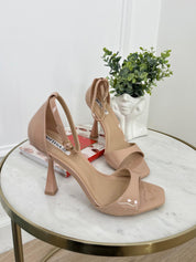Beige sandals on a thin heel