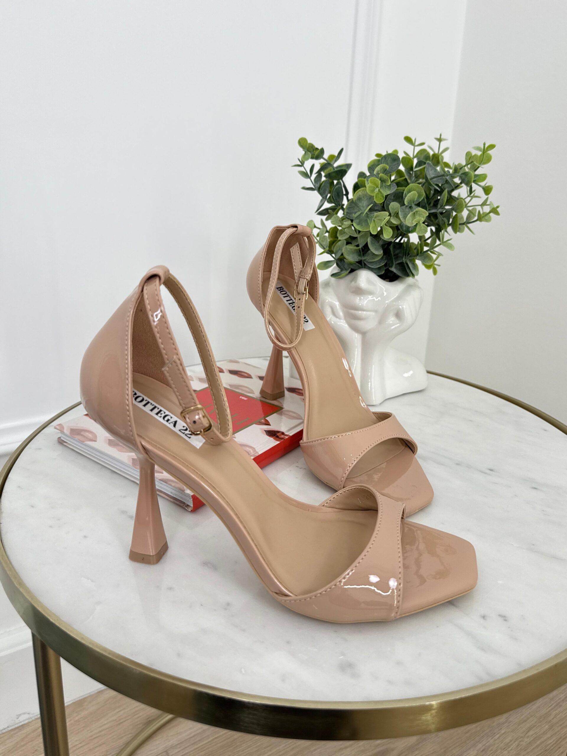 Beige sandals on a thin heel
