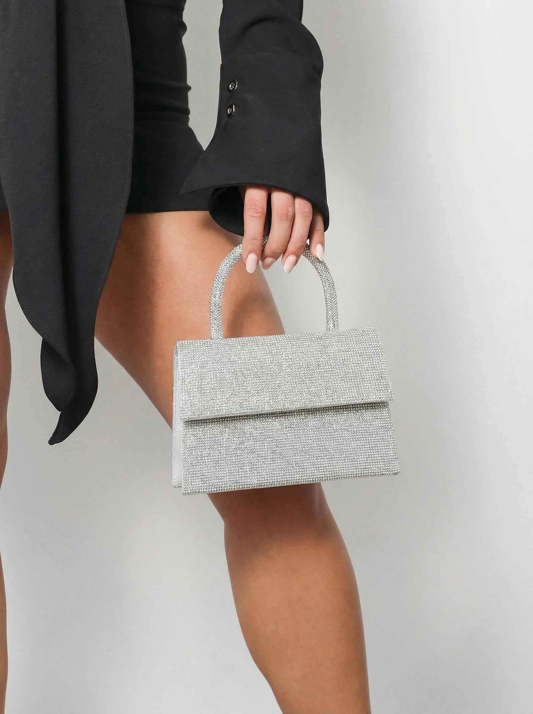 Srebrna šljokičasta večernja torbica
