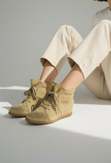 Red sneakers made of genuine leather