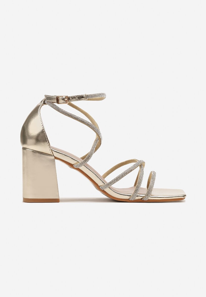 Goldene Sandalen mit Blockabsatz