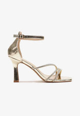 Gold sandals on a thin heel