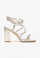 Gold sandals on a thin heel