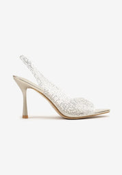 Gold sandals on a thin heel