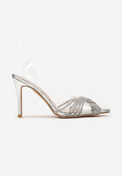 Silver sandals on a thin heel