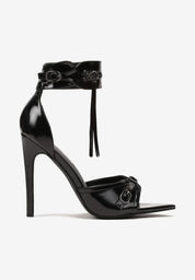 Black sandals with thin heels