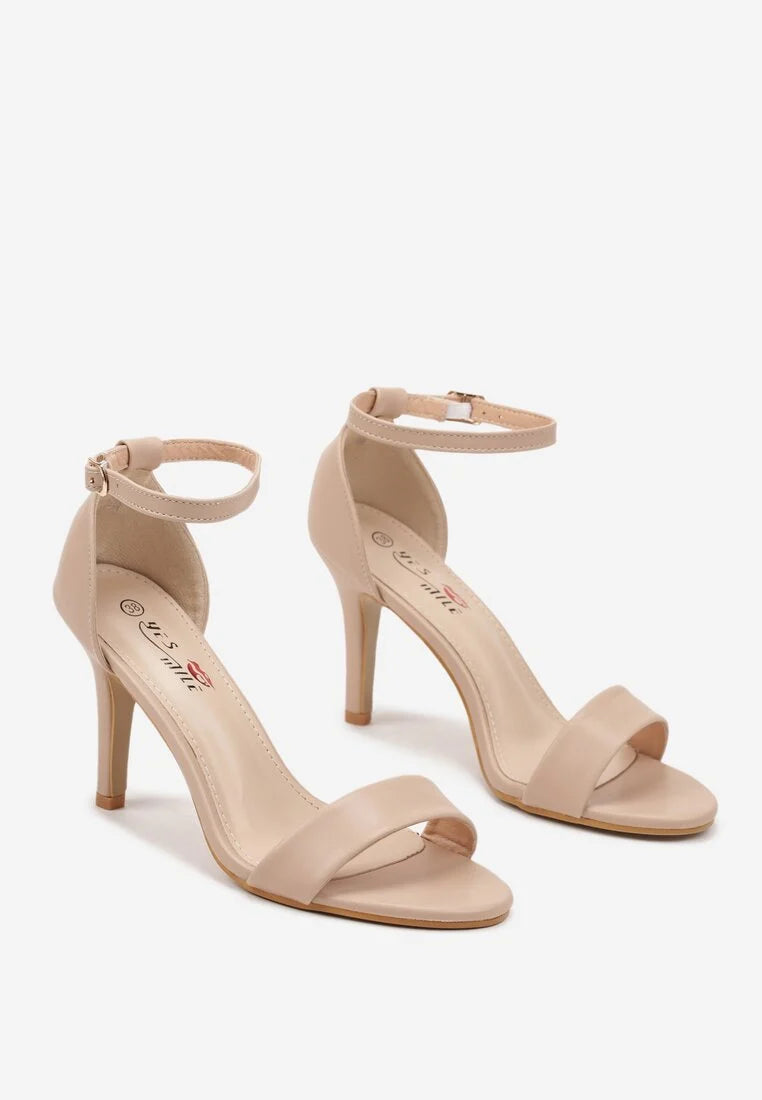 Beige sandals on a thin heel