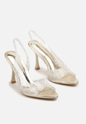 Gold sandals on a thin heel