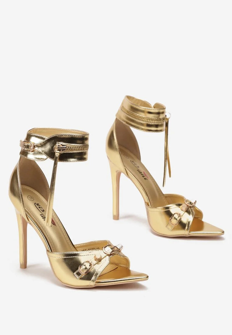 Gold sandals on a thin heel
