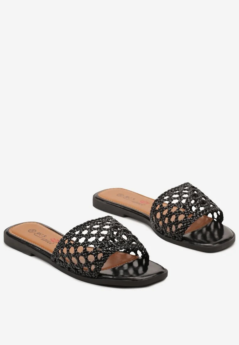 Black flat slippers