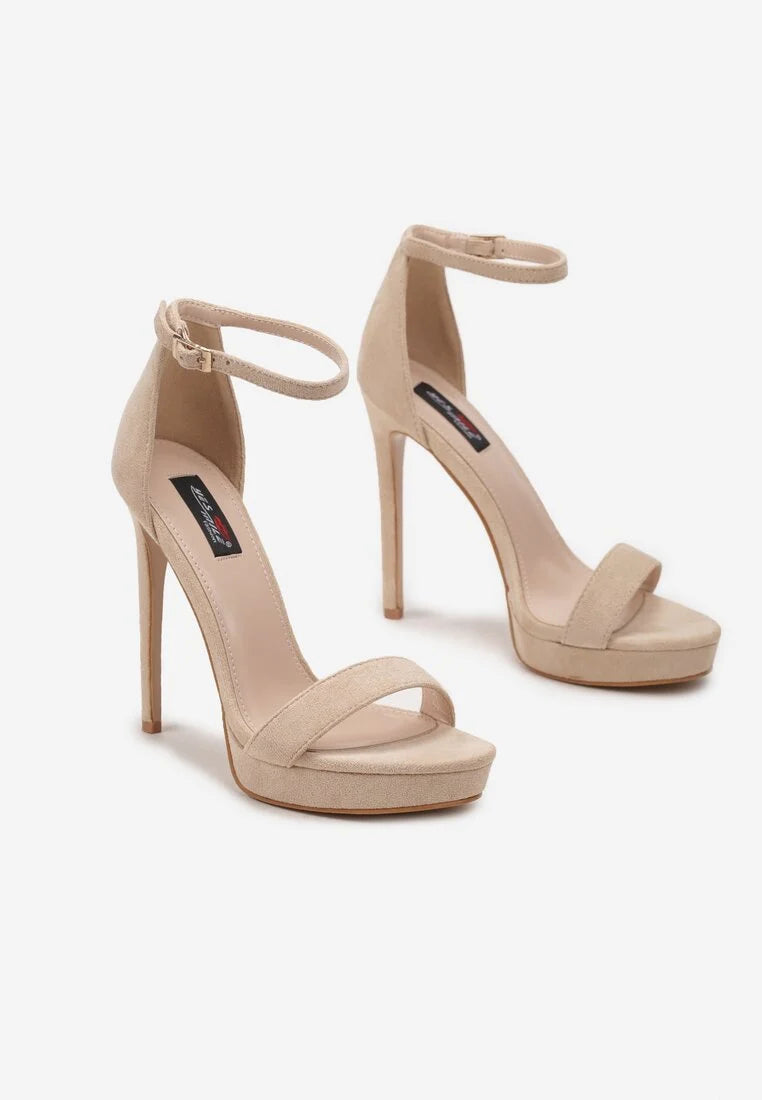 Beige sandals on a thin heel