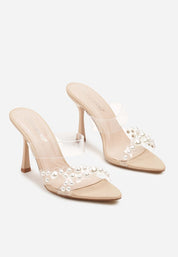 Beige sandals on a thin heel