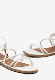 White flat sandals