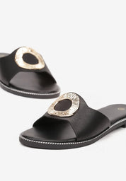 Black flat slippers