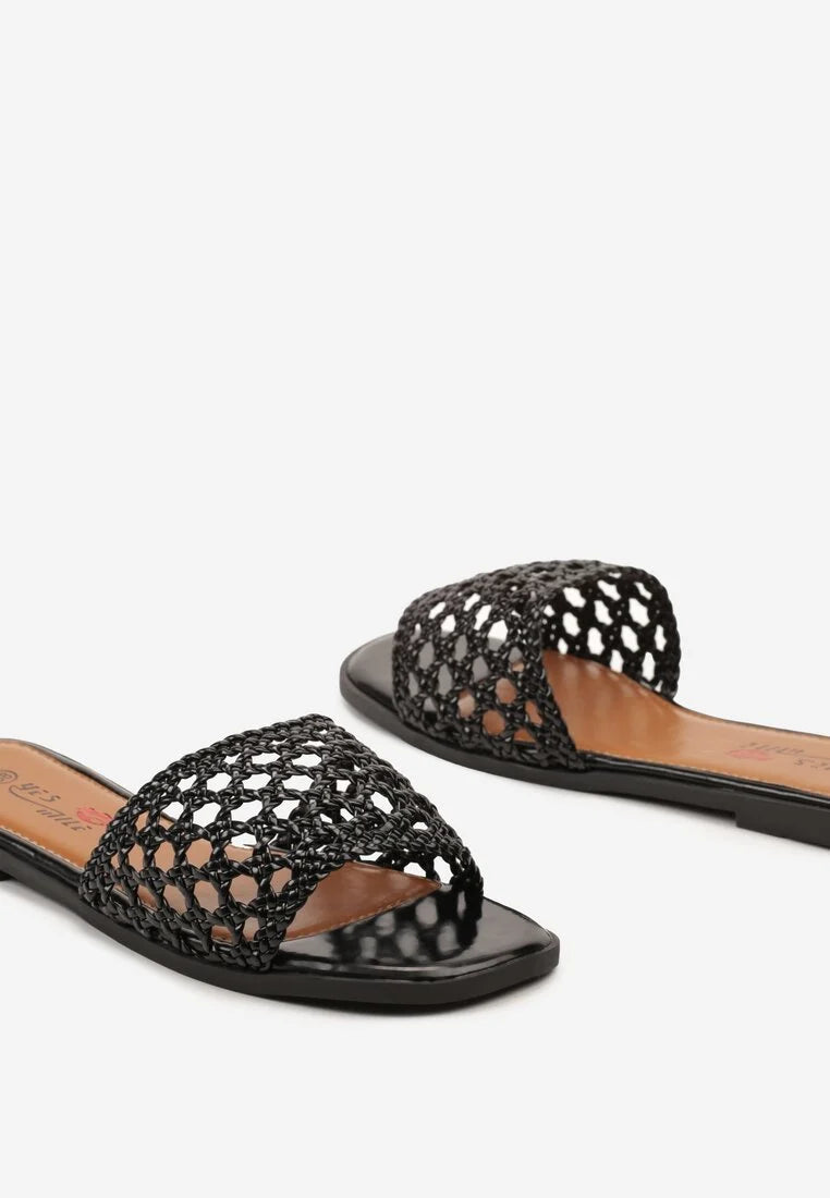 Black flat slippers