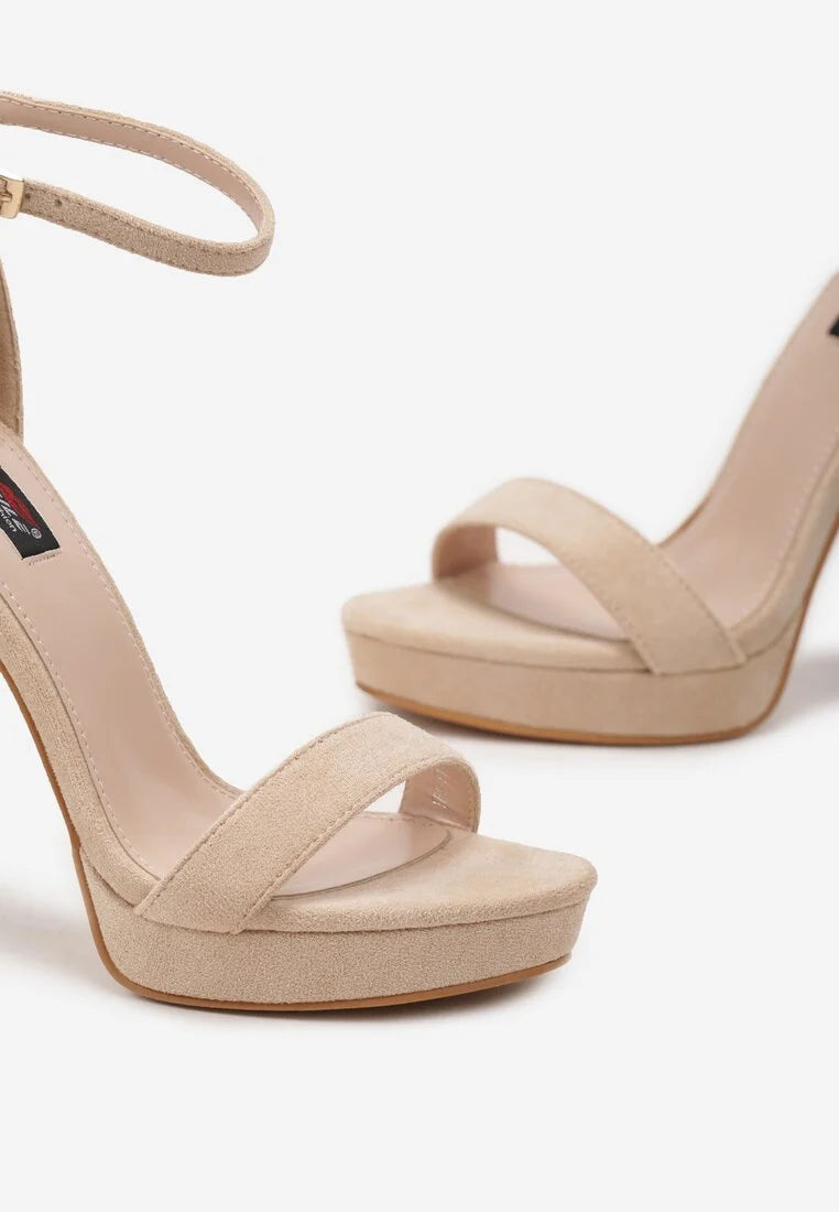 Beige sandals on a thin heel