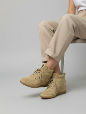 Red sneakers made of genuine leather