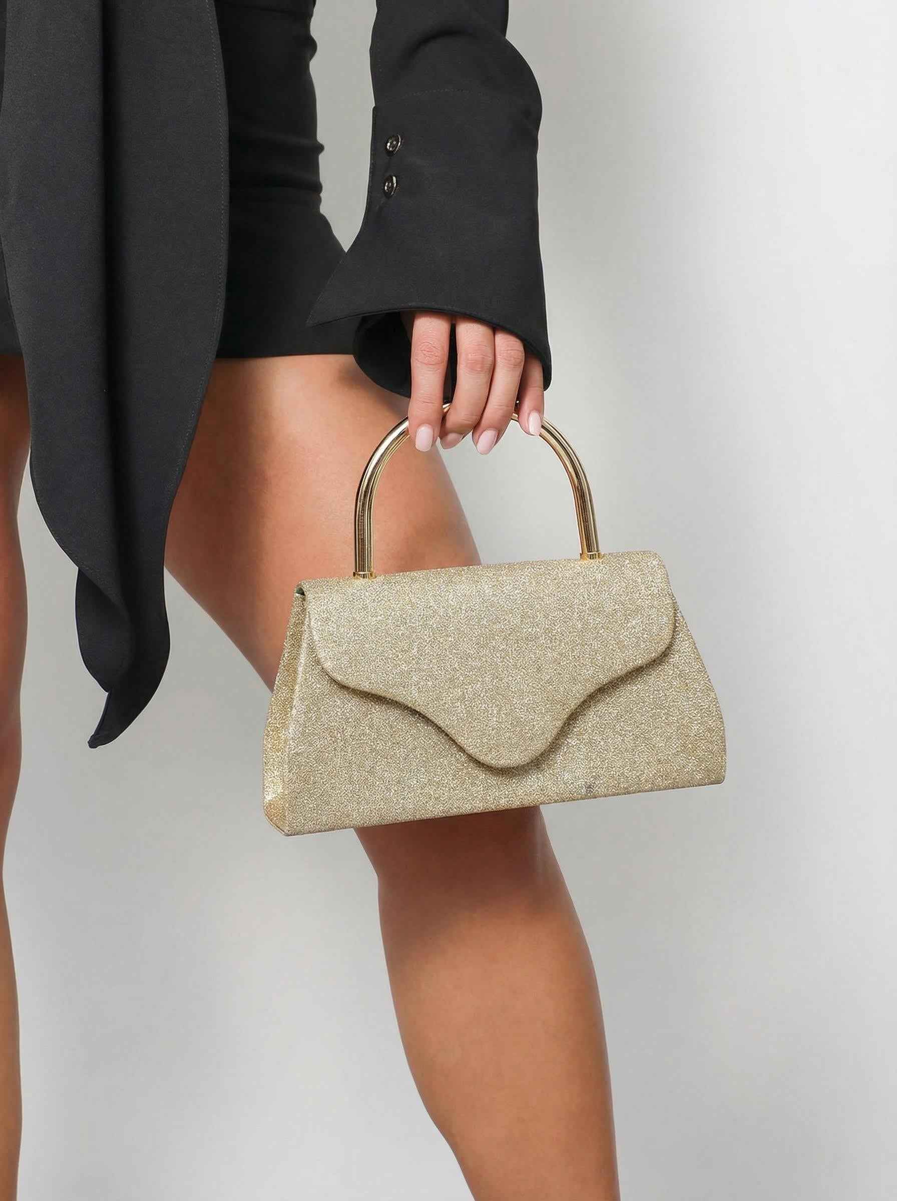 Zlatna šljokičasta večernja torbica