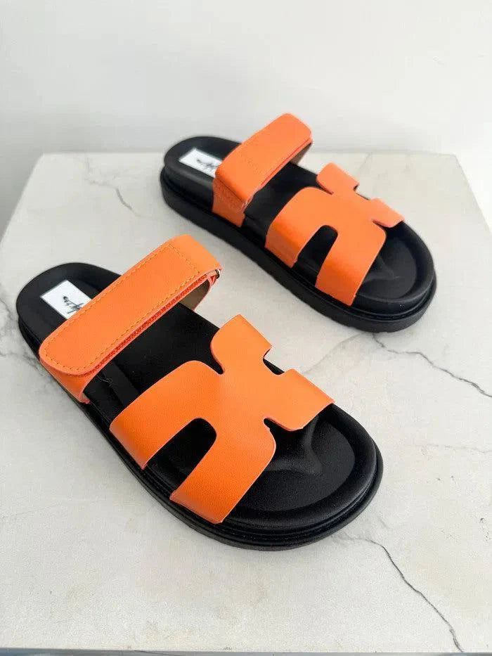 Orange flat slippers