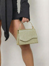 Zlatna šljokičasta večernja torbica