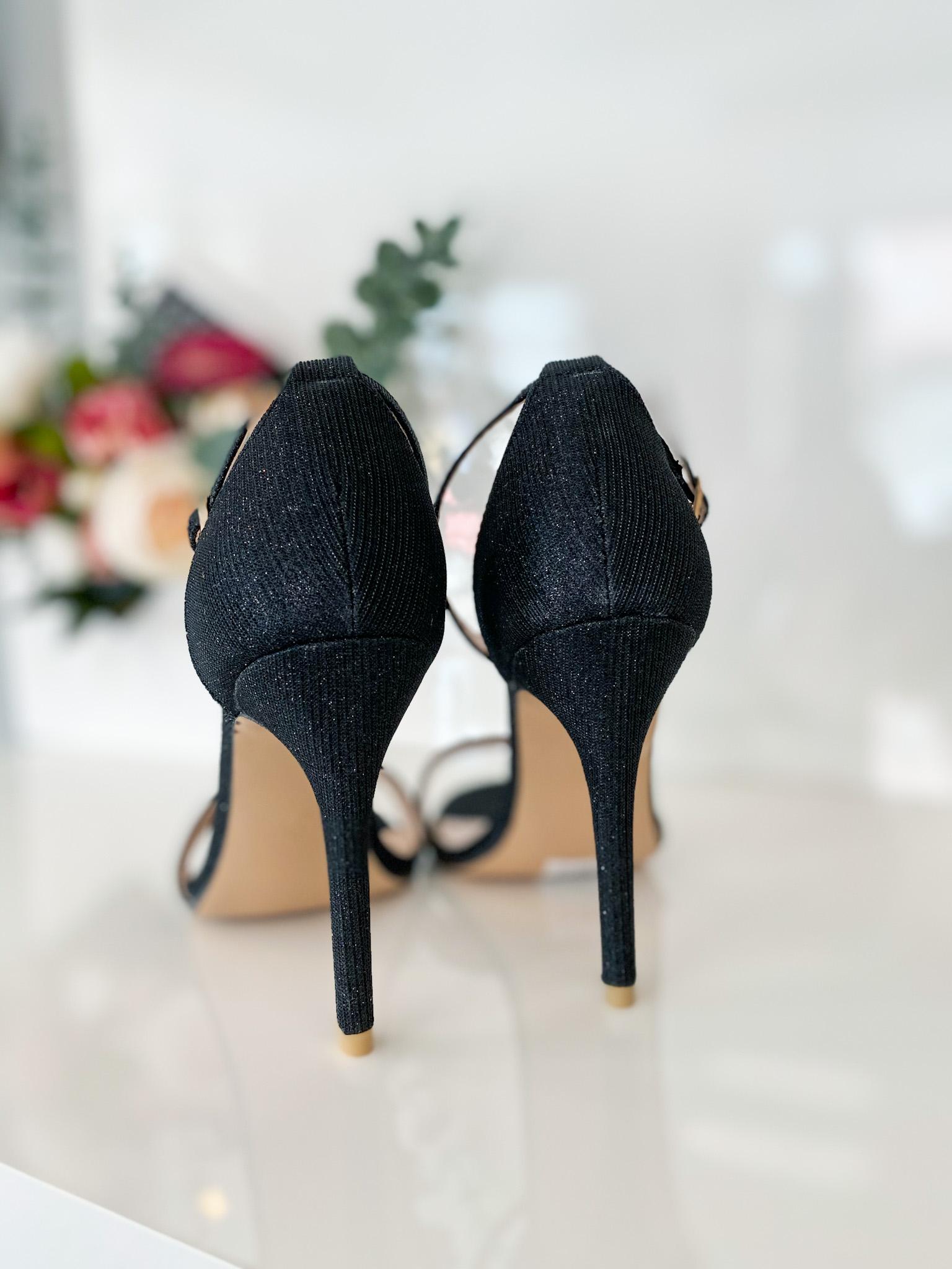 Black sandals with thin heels
