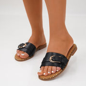 Black flat slippers