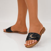 Black flat slippers