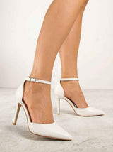Nude thin heeled shoes.