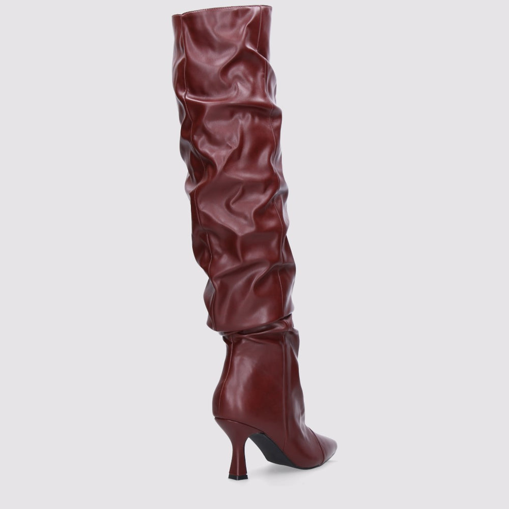 Burgundy high boots with a thin heel