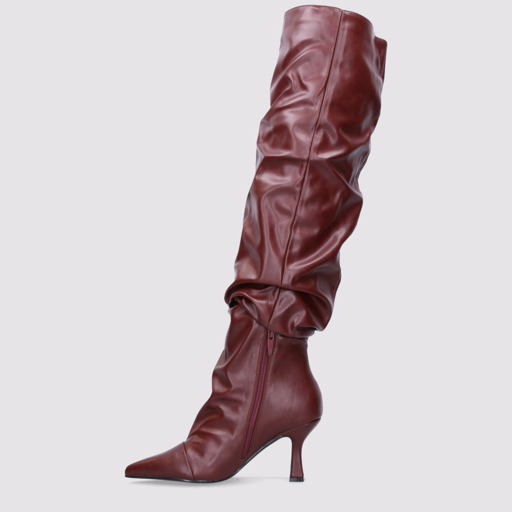 Burgundy high boots with a thin heel
