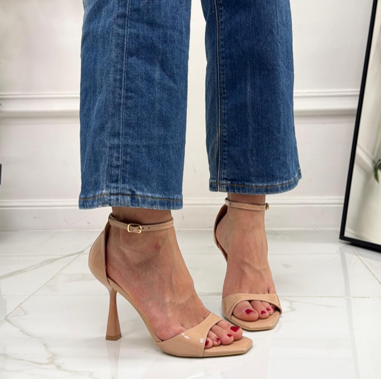 Beige sandals on a thin heel