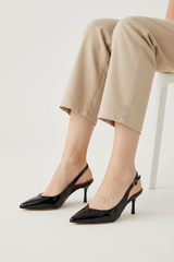 Črne pete na tanko peto