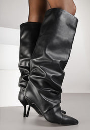 Black pleated boots with a thin heel 