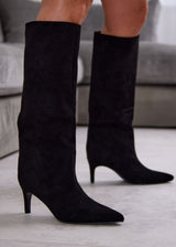 Black boots on a thin heel