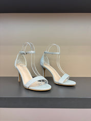 Black sandals with thin heels