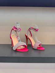 Silver sandals on a thin heel